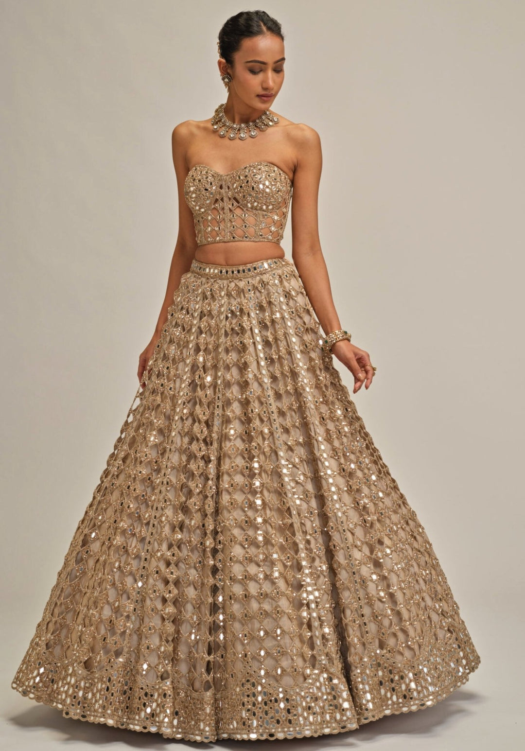 Vvani by Vani Vats Beige Gold Embroidered Georgette Corset LehengaFabilicious Fashion