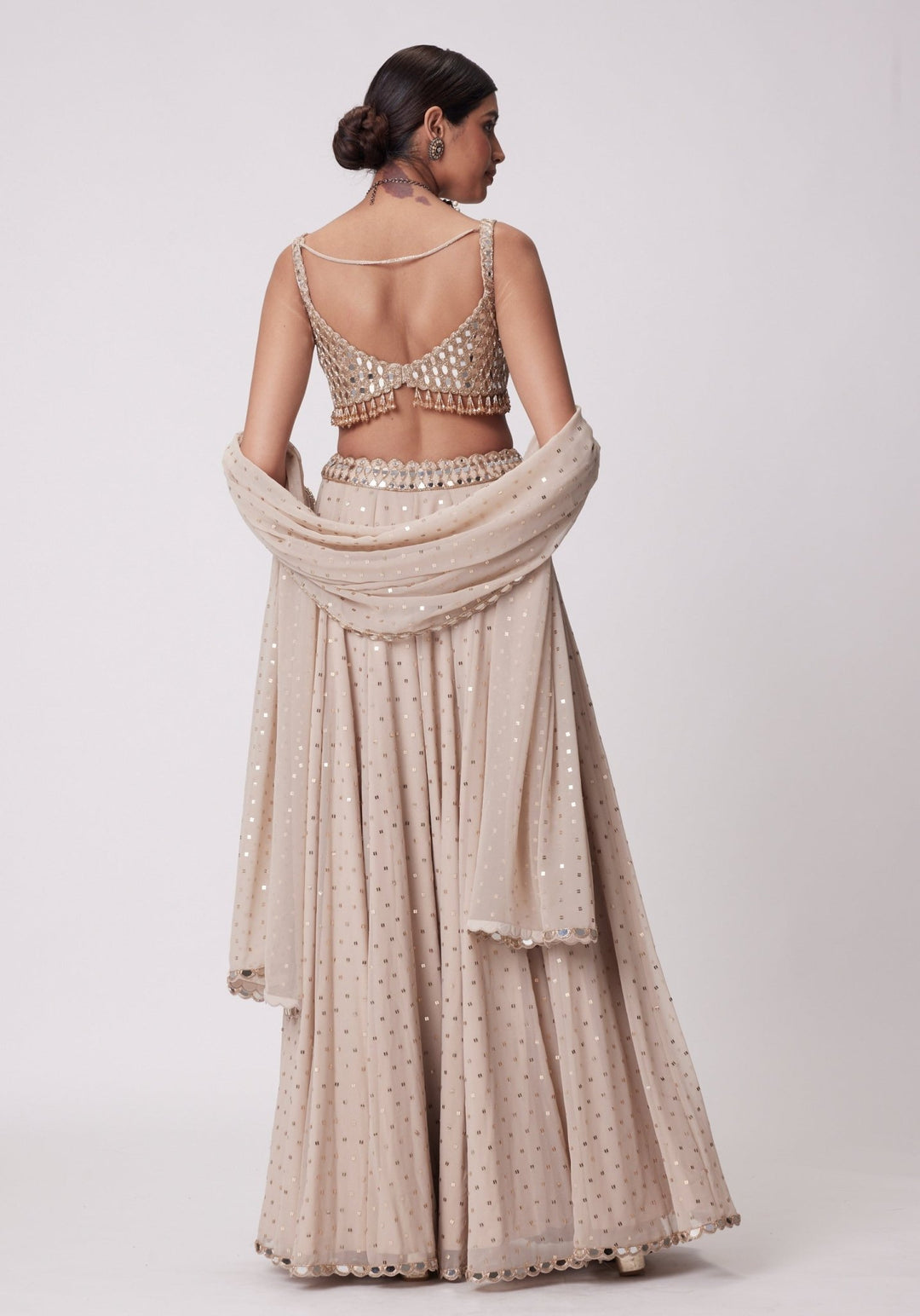 Beige Gold Georgette Lehenga With Embroidered Sleeveless Blouse Vvani by Vani Vats - Fabilicious Fashion