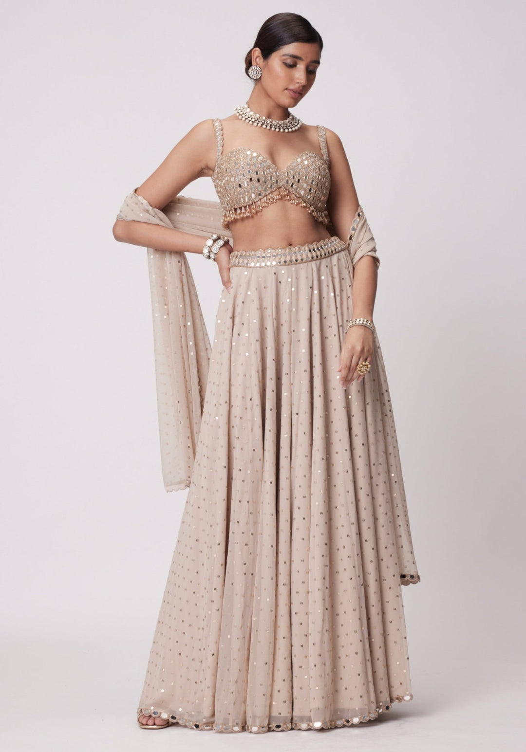 Beige Gold Georgette Lehenga With Embroidered Sleeveless Blouse Vvani by Vani Vats - Fabilicious Fashion