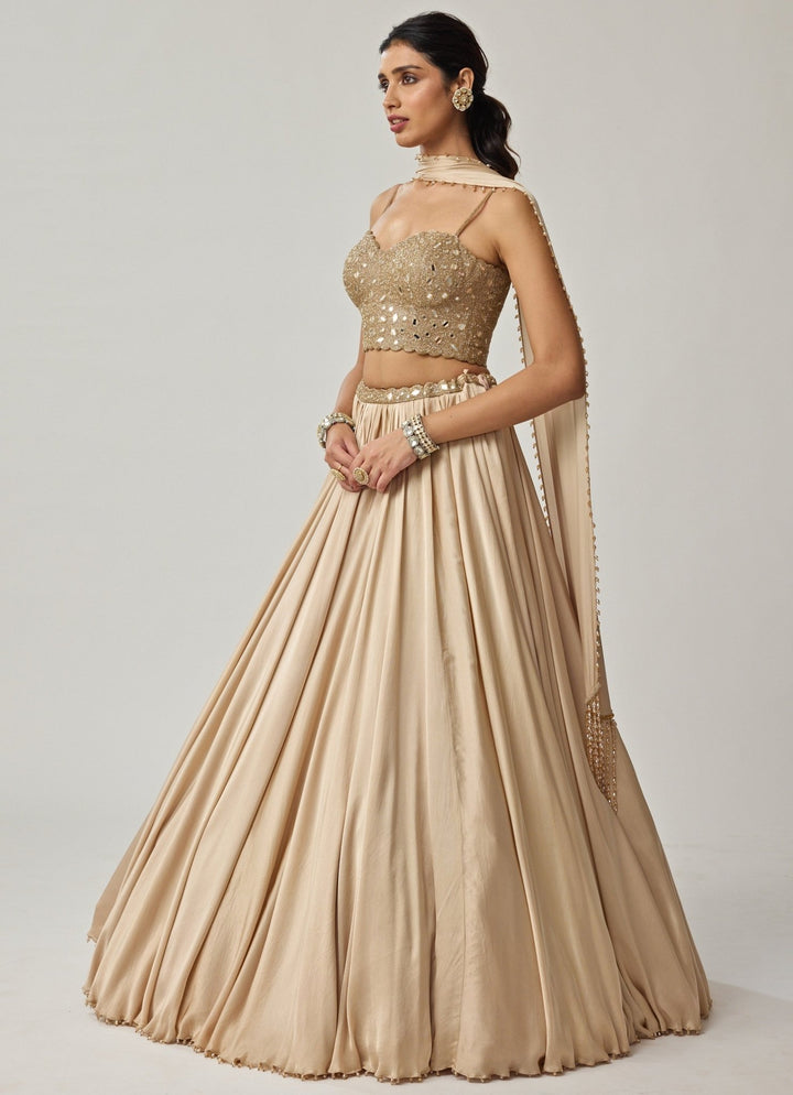 Beige Gold Mirror Embroidered Corset With Satin Lehenga Vvani by Vani Vats - Fabilicious Fashion