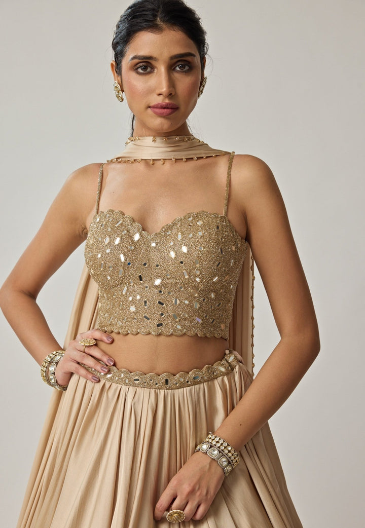Beige Gold Mirror Embroidered Corset With Satin Lehenga Vvani by Vani Vats - Fabilicious Fashion