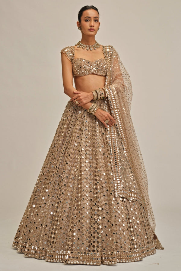 Beige and gold mirror embroidered georgette bridal lehenga by Vvani by Vani Vats