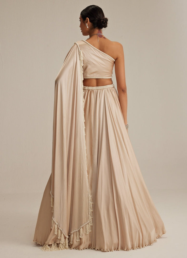 Beige Gold Satin Lehenga With Draped One Shoulder Trail Vvani by Vani Vats - Fabilicious Fashion