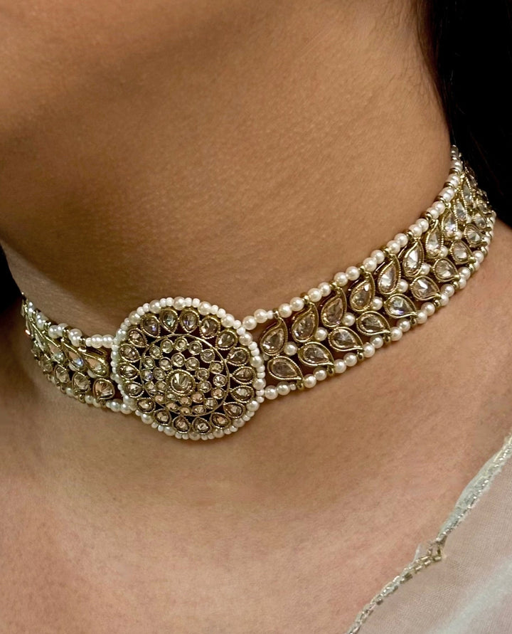 Naymee Beige Kundan Choker Set With White BeadsFabilicious Fashion
