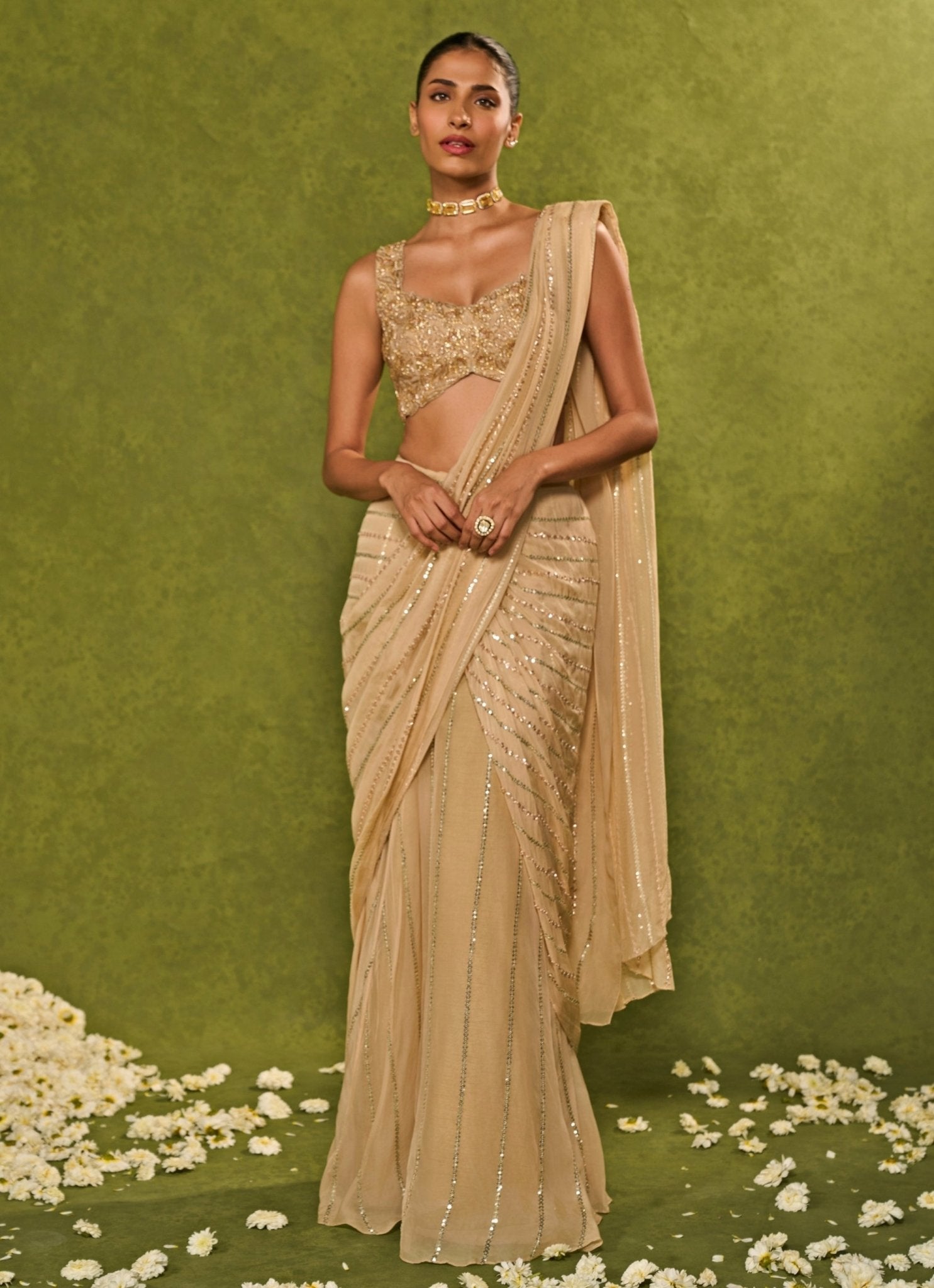 Beige organza pre draped saree for wedding guest neutral metallic styling