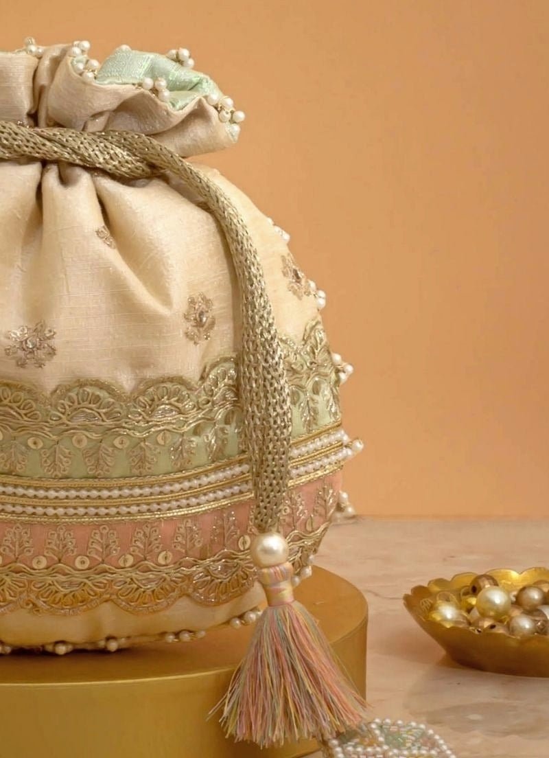 Amyra Beige Silk Potli With Mint Green And Pink WorkFabilicious Fashion