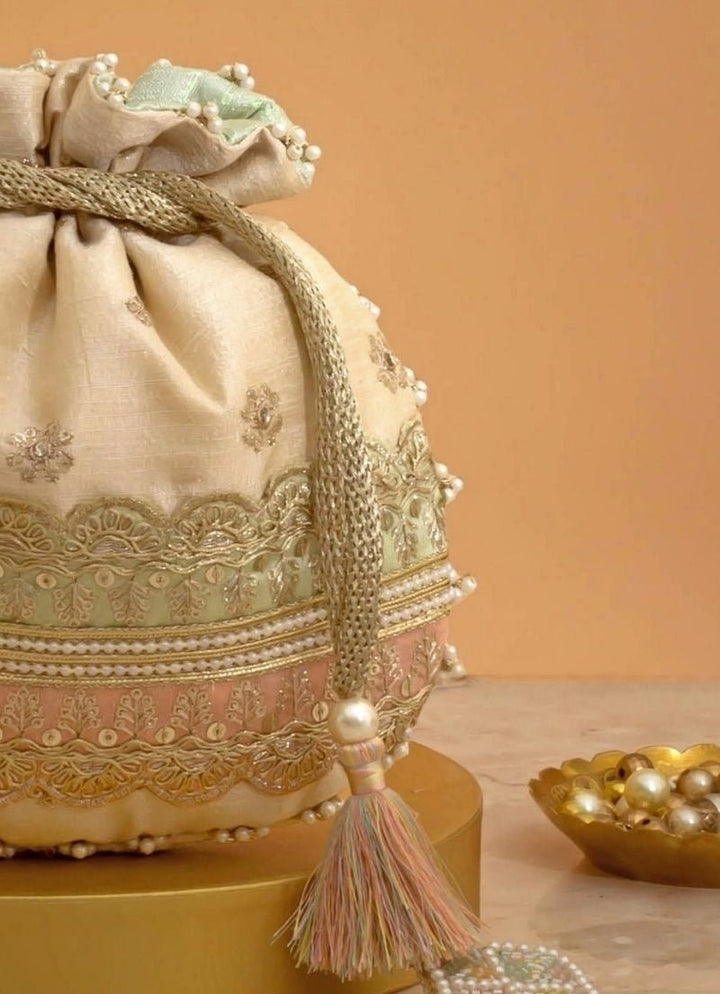 Amyra Beige Silk Potli With Mint Green And Pink WorkFabilicious Fashion