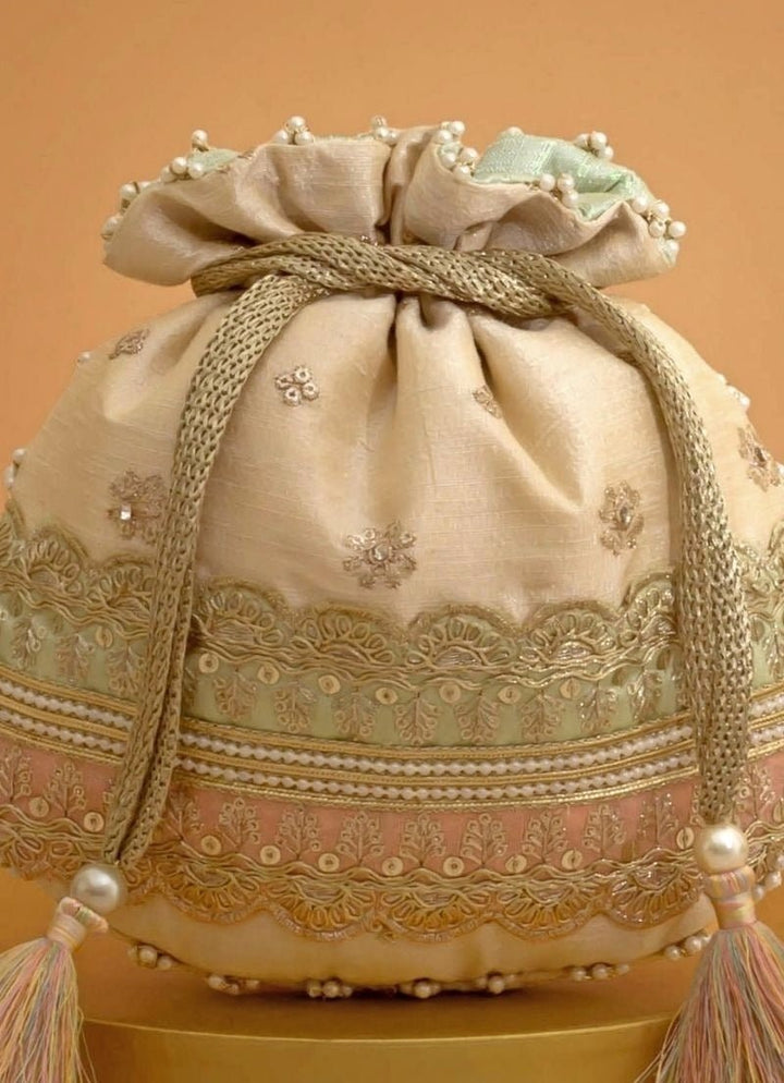 Amyra Beige Silk Potli With Mint Green And Pink WorkFabilicious Fashion