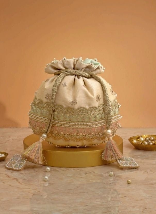 Amyra Beige Silk Potli With Mint Green And Pink WorkFabilicious Fashion