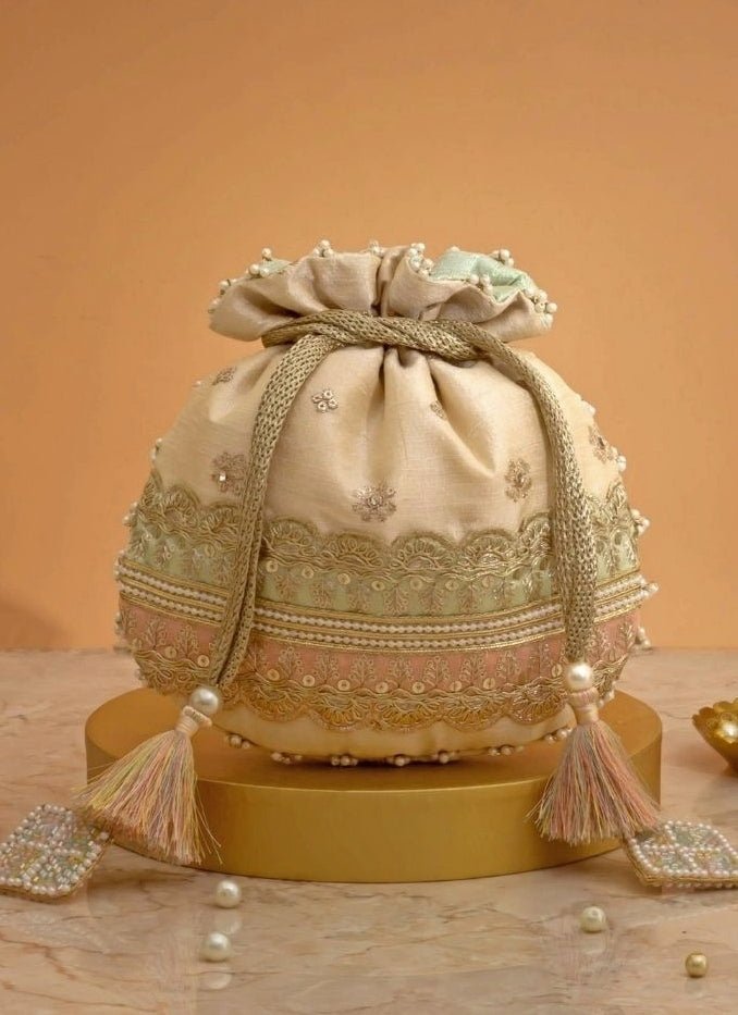 Amyra Beige Silk Potli With Mint Green And Pink WorkFabilicious Fashion