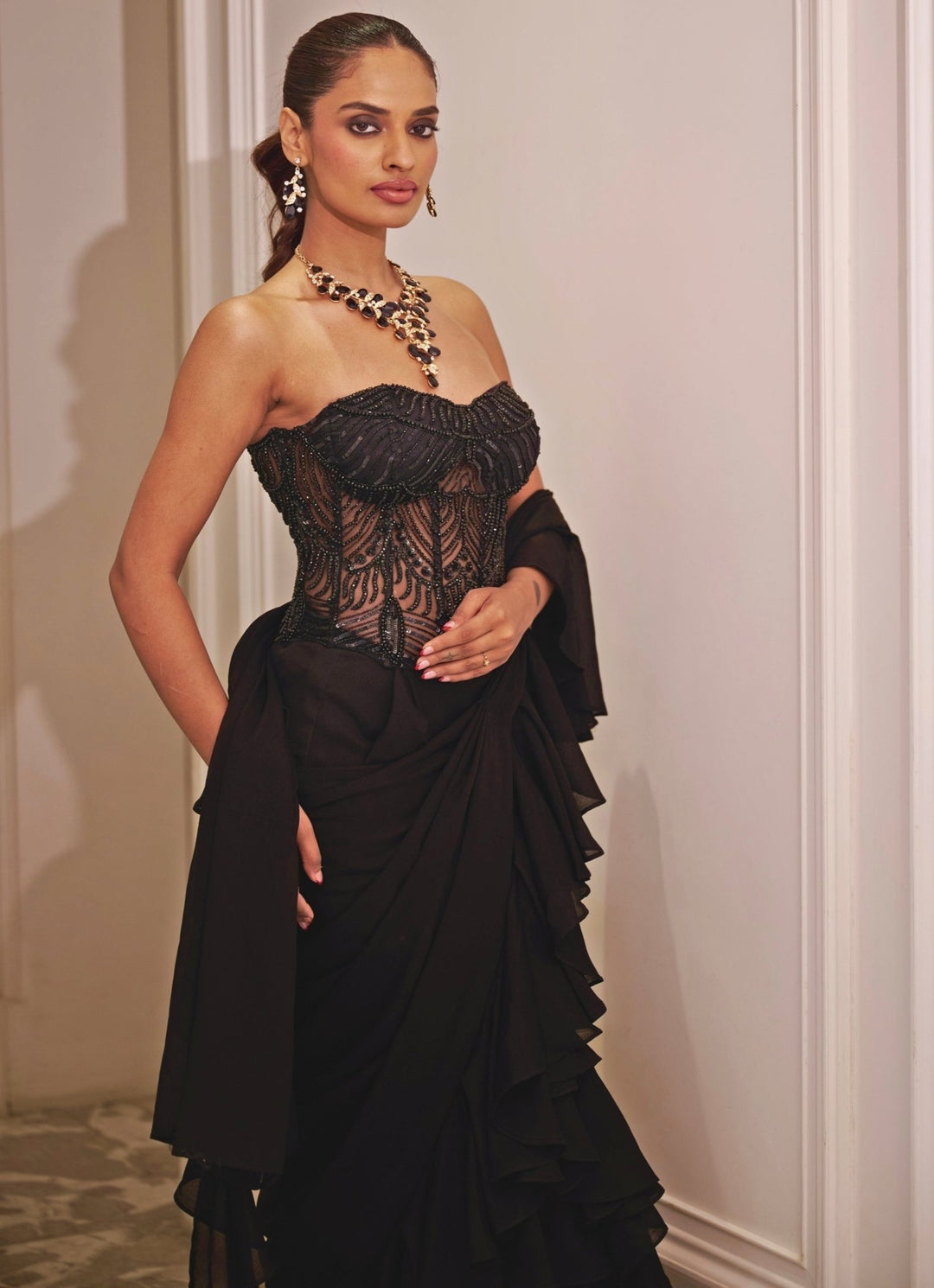 Black Chiffon Predraped Ruffle Saree Set With Corset Rashika Sharma - Fabilicious Fashion