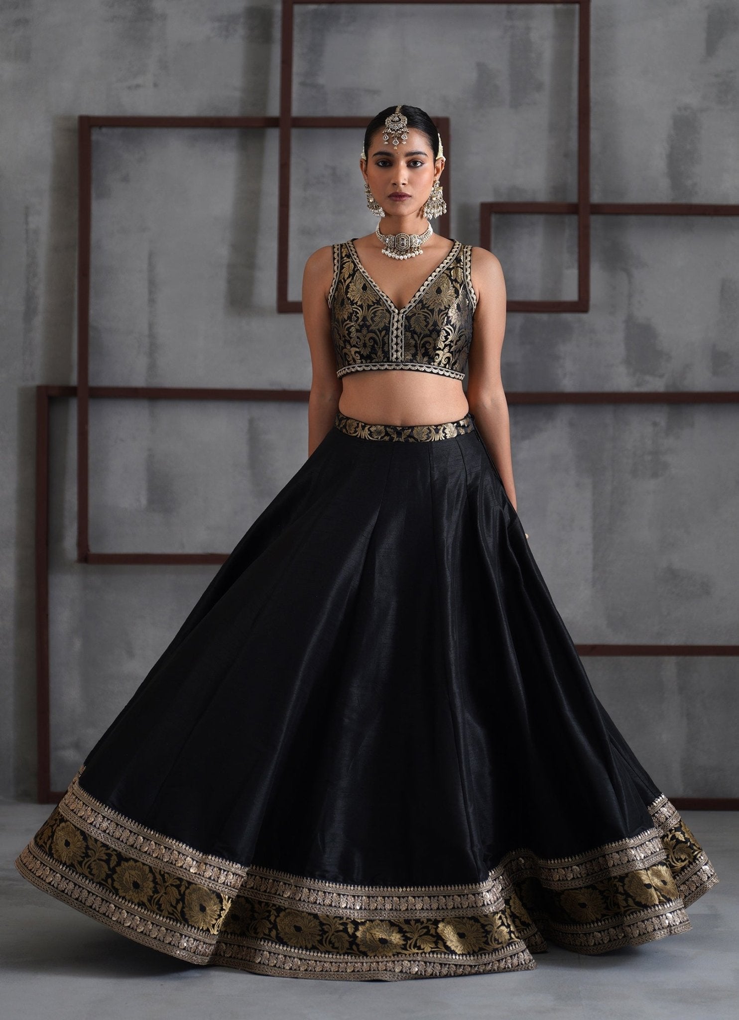 Black embroidered brocade lehenga by Deepika Chadha for sangeet