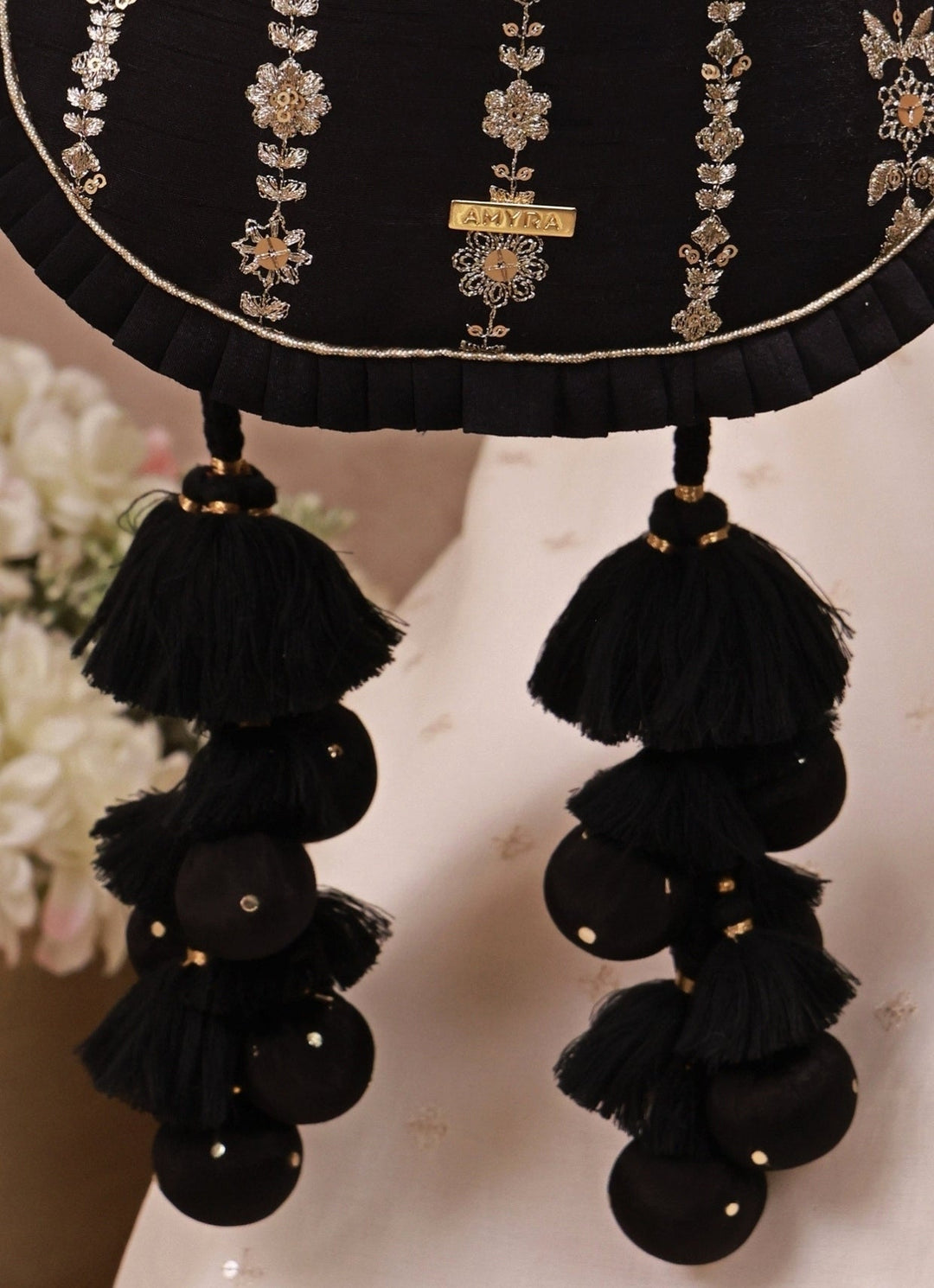 Amyra Black Embroidered Silk Pleated PotliFabilicious Fashion