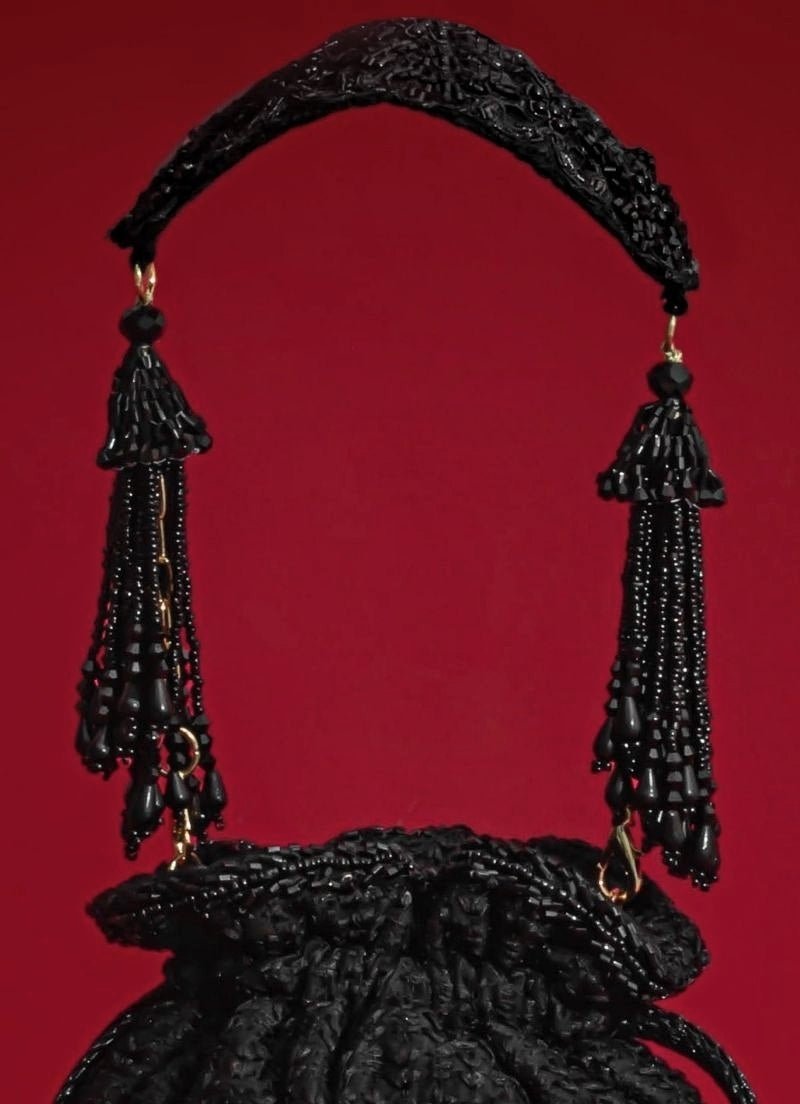 Amyra Black Embroidered Silk PotliFabilicious Fashion