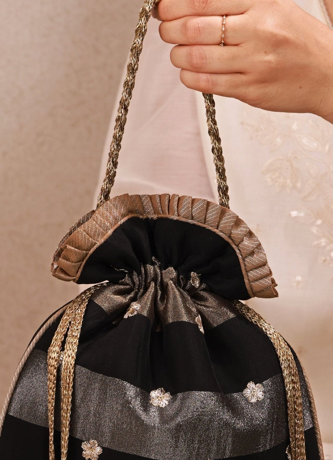 Amyra Black Embroidered Tissue Pleated PotliFabilicious Fashion