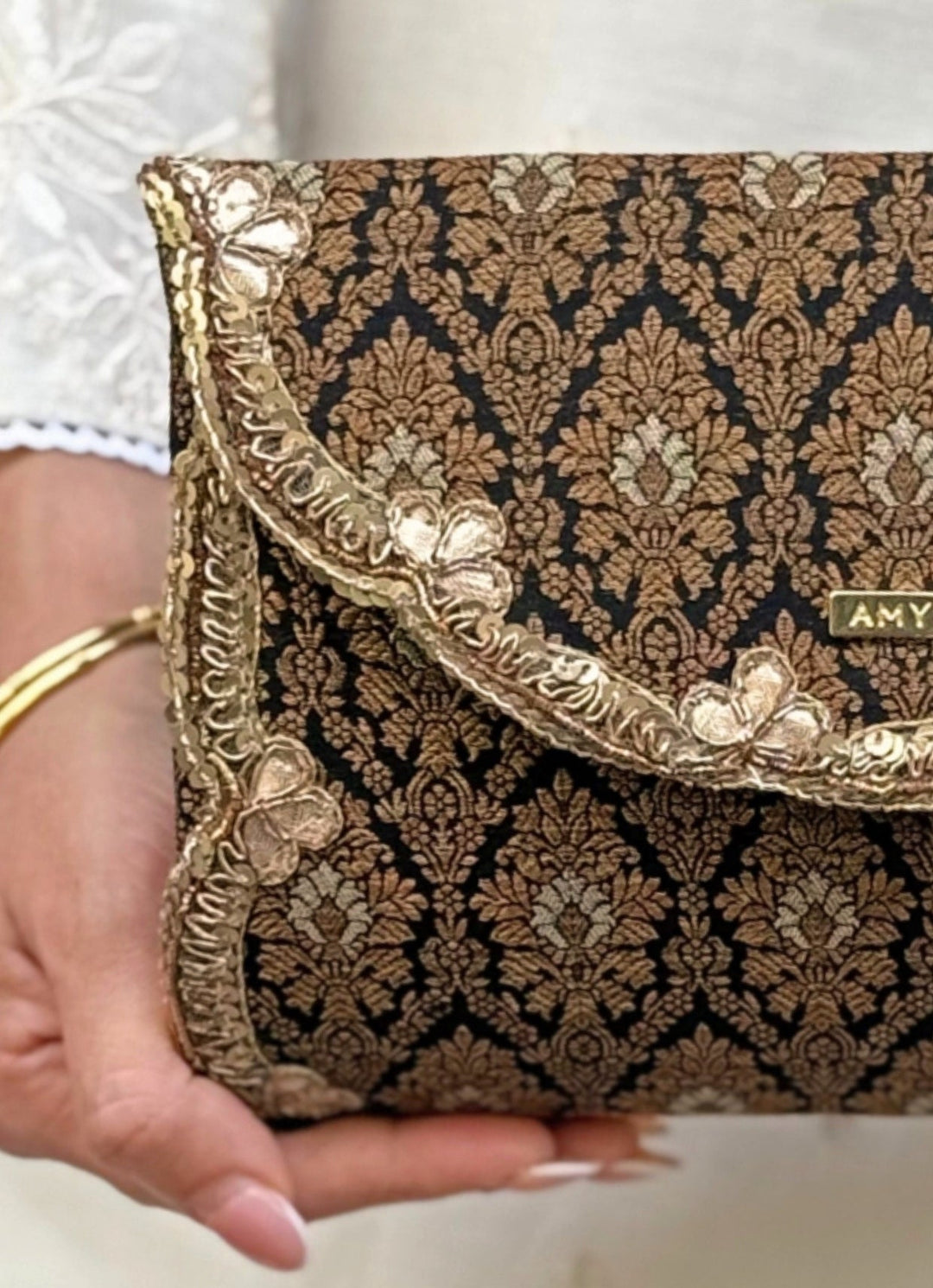 Amyra Black Raw Silk ClutchFabilicious Fashion