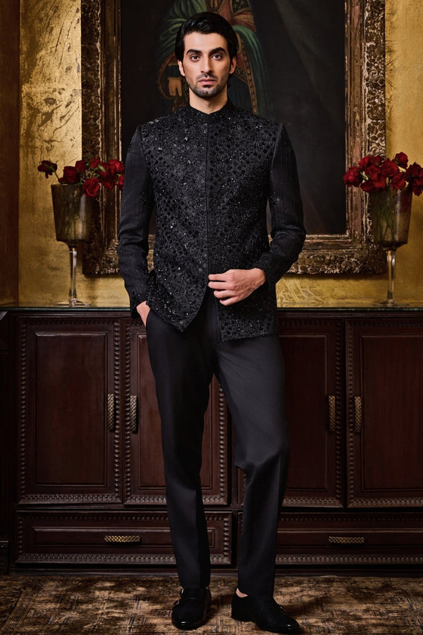Black raw silk jodhpuri bandhgala set for men by Nitika Gujral