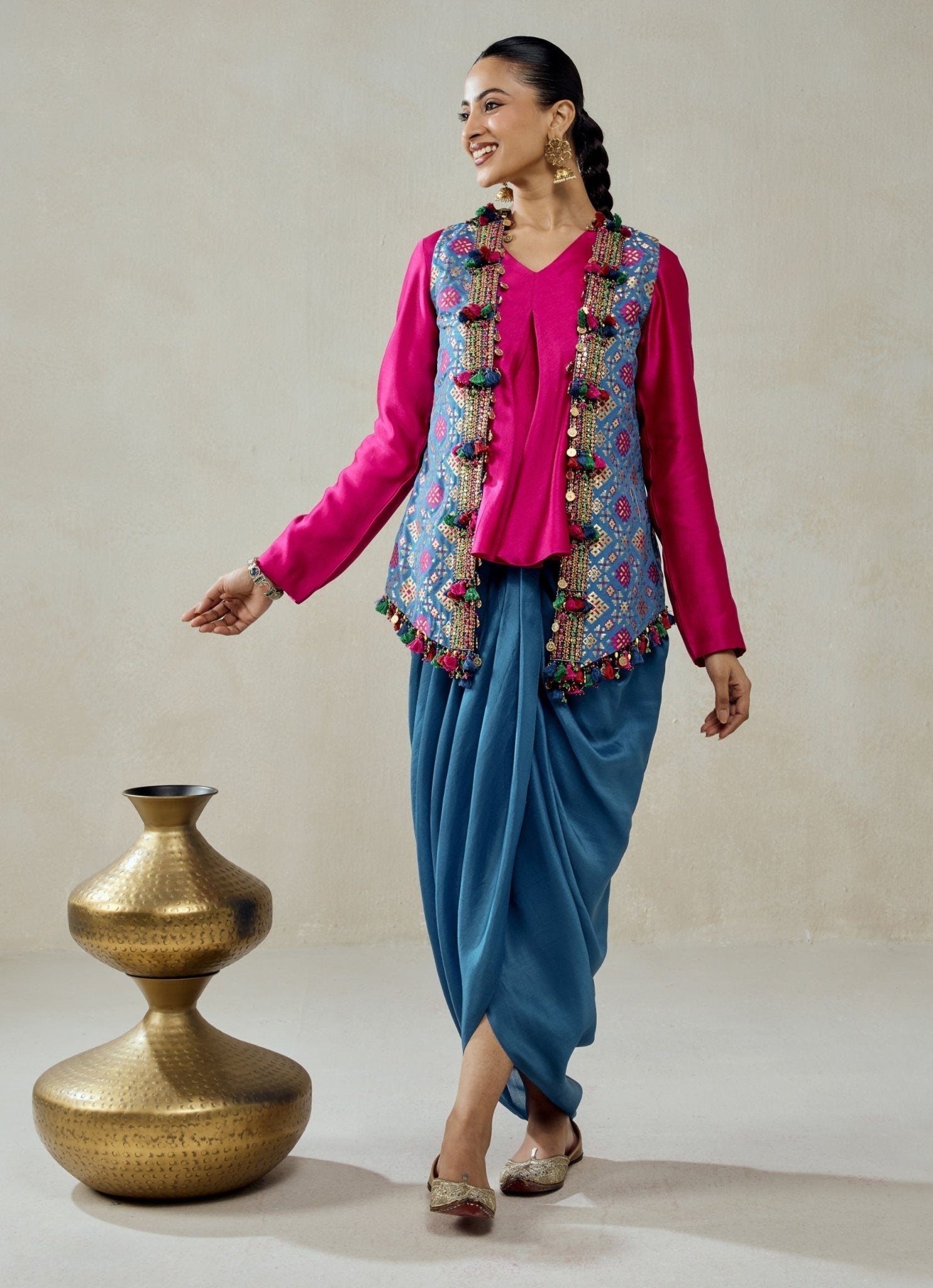 Blue and pink Patola silk dhoti skirt set by Nitika Gujral for festive wedding guest