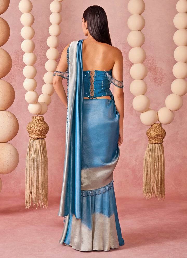 Chamee And Palak Blue And Silver Ombre Shimmer Tissue Pre-Draped Saree With CorsetFabilicious Fashion