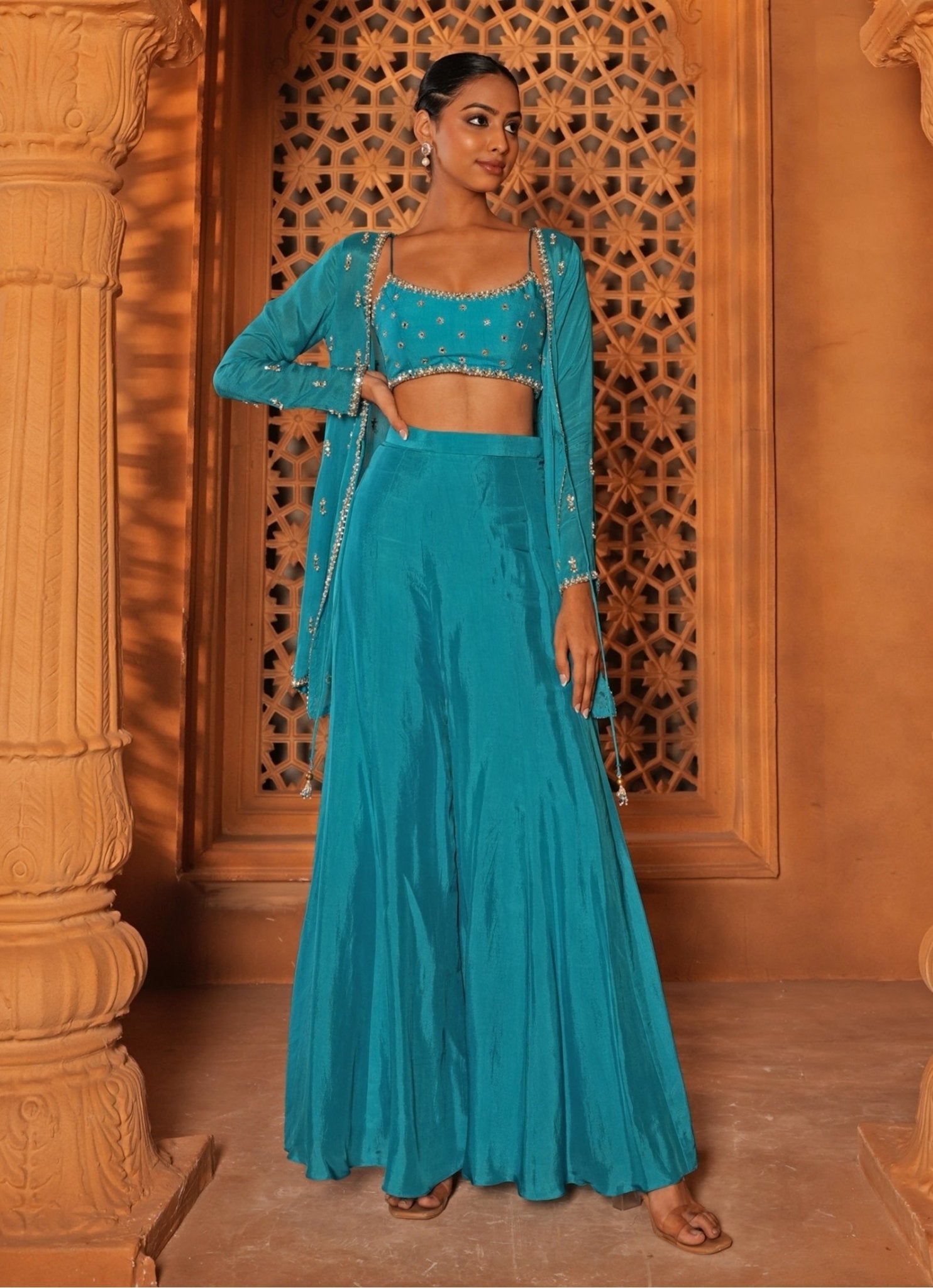 Blue embroidered silk blouse sharara set with jacket by Enamour by Radha — indo western outfit for an evening Indian wedding in New York