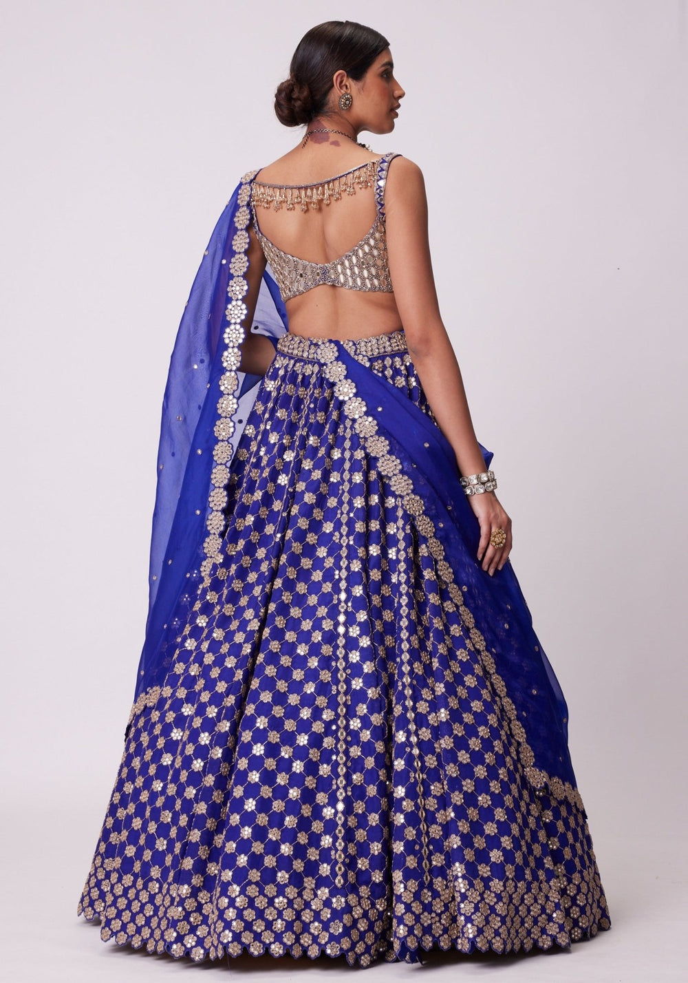 Blue Flower Embroidered Lehenga With Sleeveless Blouse Vvani by Vani Vats - Fabilicious Fashion