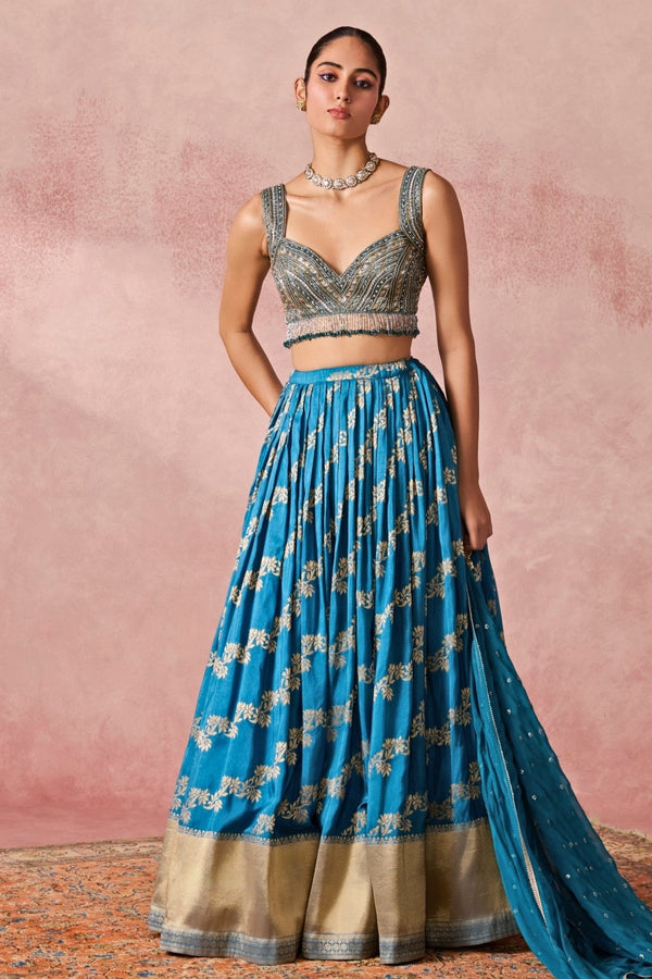 Blue jamewar pleated lehenga set by Chamee and Palak for a reception