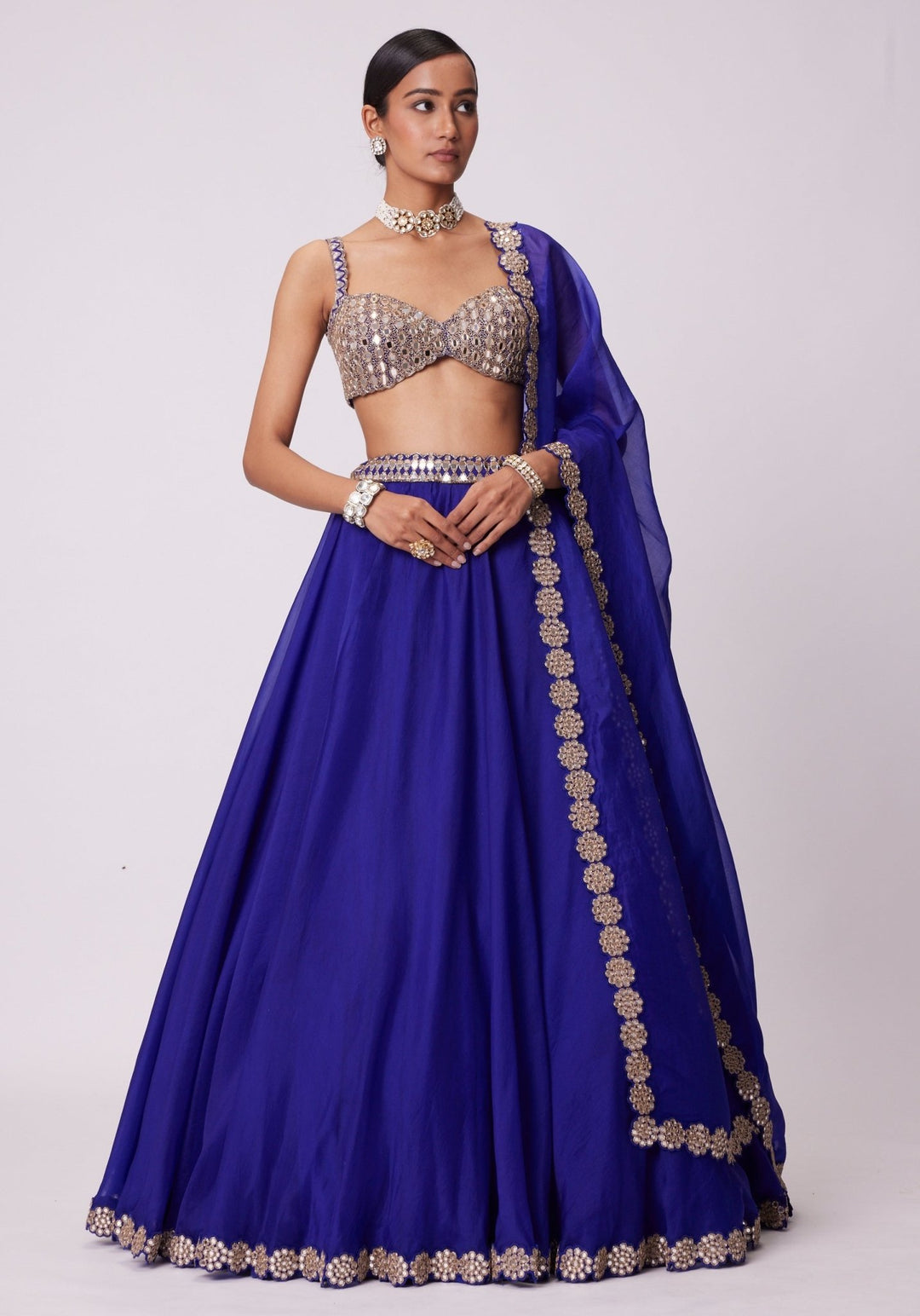 Blue Organza Lehenga With Embroidered Sleeveless Gold Blouse Vvani by Vani Vats - Fabilicious Fashion