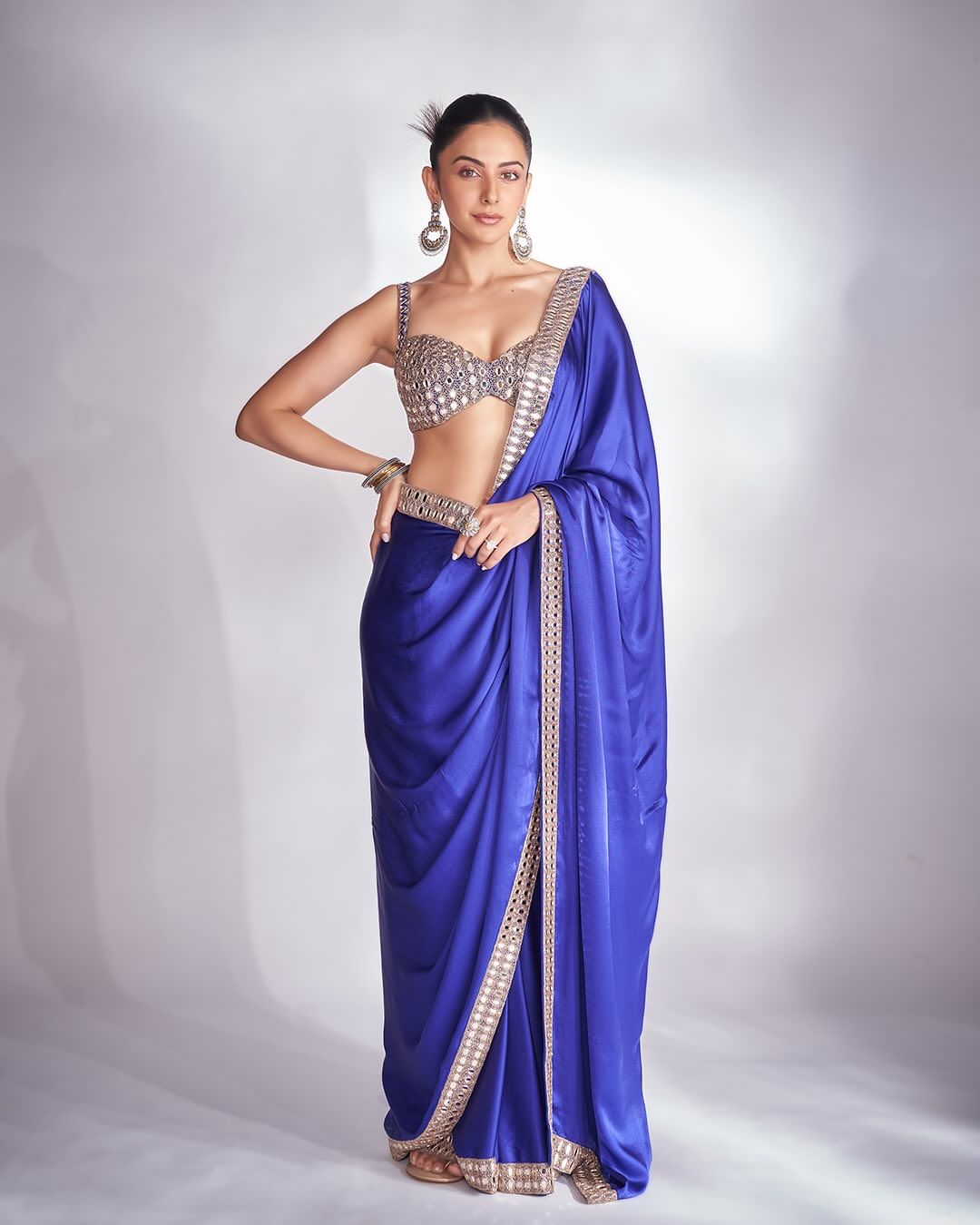 Blue Satin Saree With Sleeveless Embroidered Blouse Vvani by Vani Vats - Fabilicious Fashion