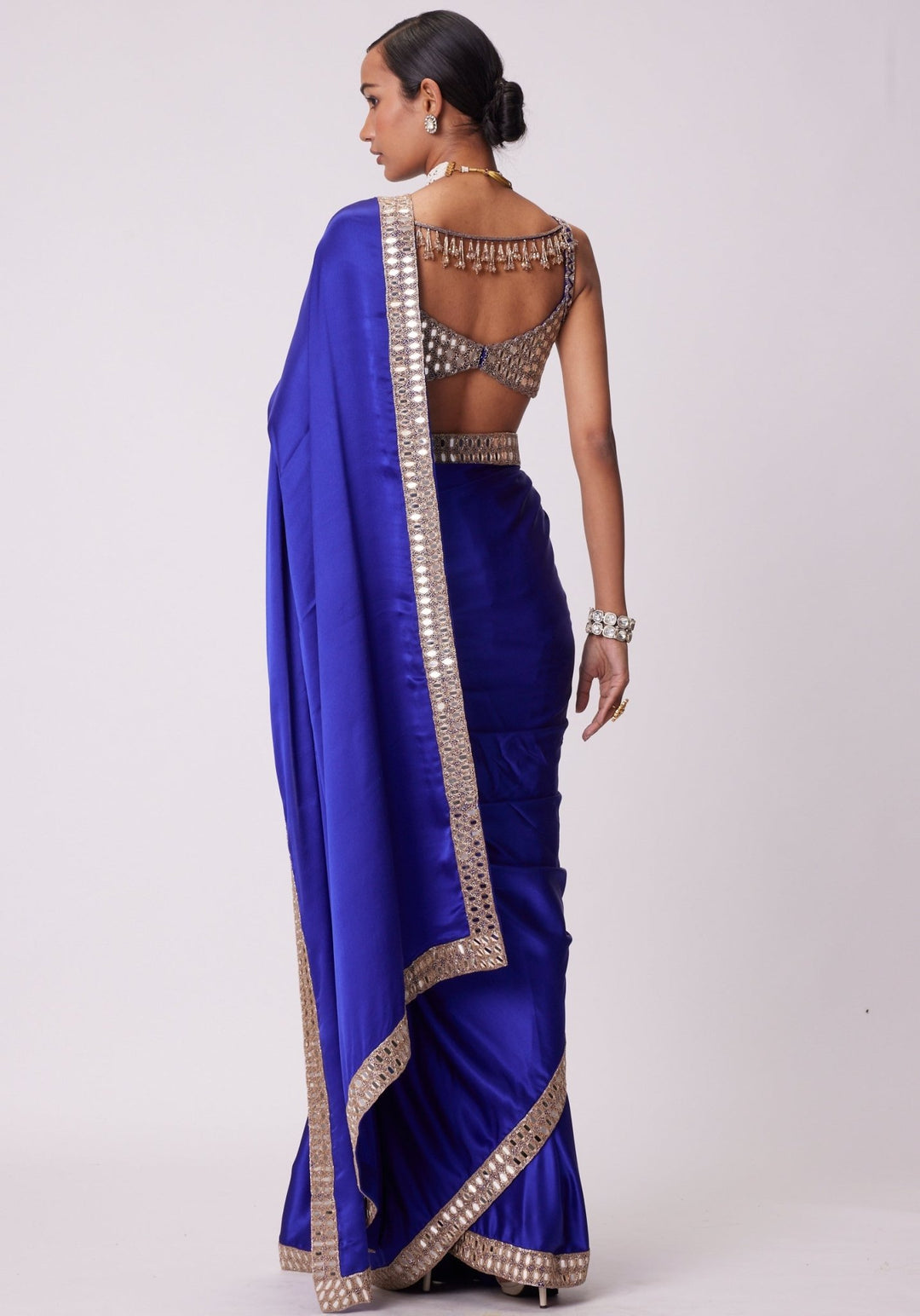 Blue Satin Saree With Sleeveless Embroidered Blouse Vvani by Vani Vats - Fabilicious Fashion