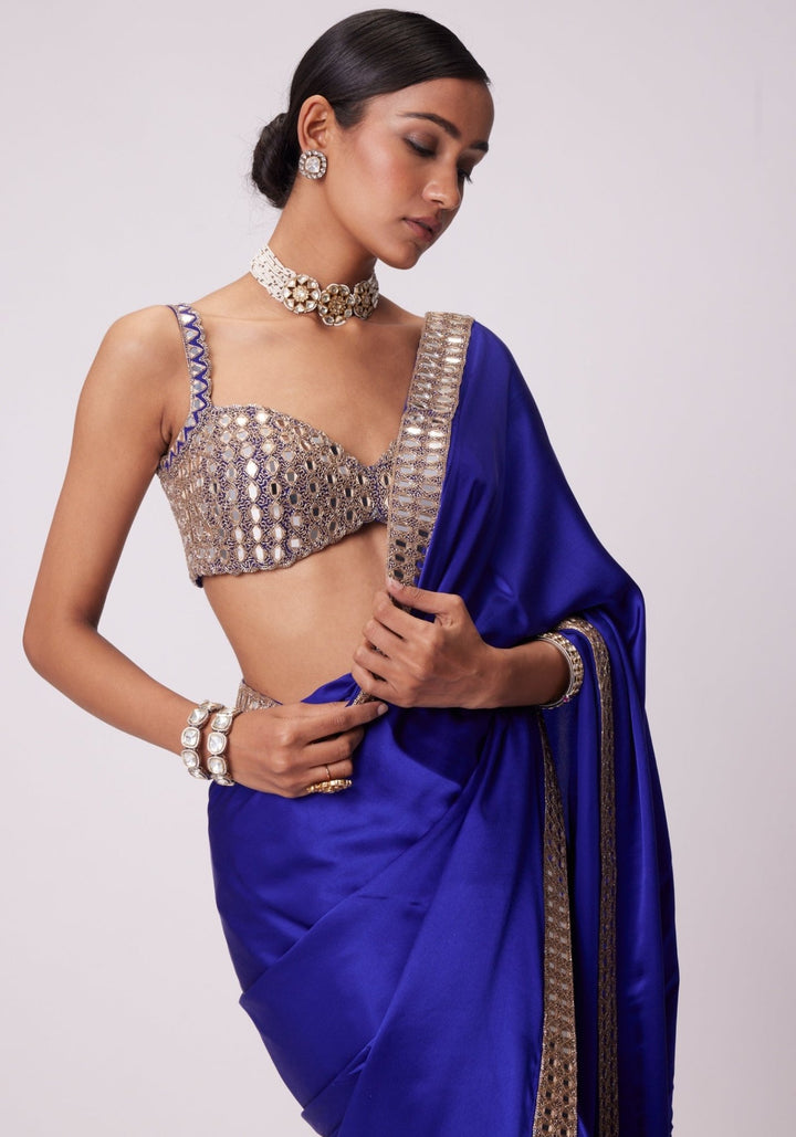 Blue Satin Saree With Sleeveless Embroidered Blouse Vvani by Vani Vats - Fabilicious Fashion