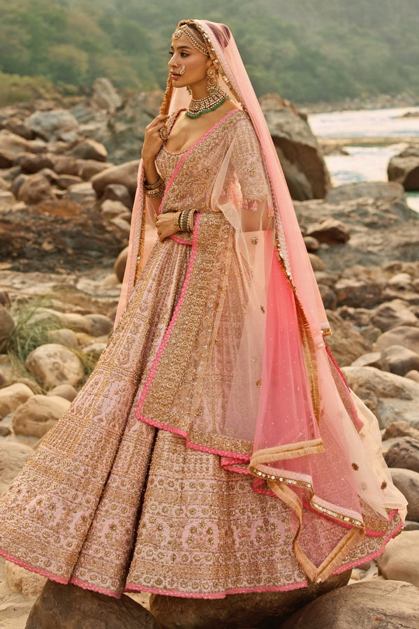 Blush pink raw silk bridal lehenga set by Nitika Gujral