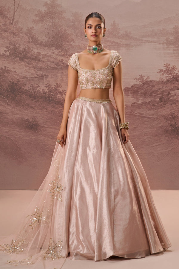 Blush pink silk tissue lehenga by Parul Gandhi for wedding guest