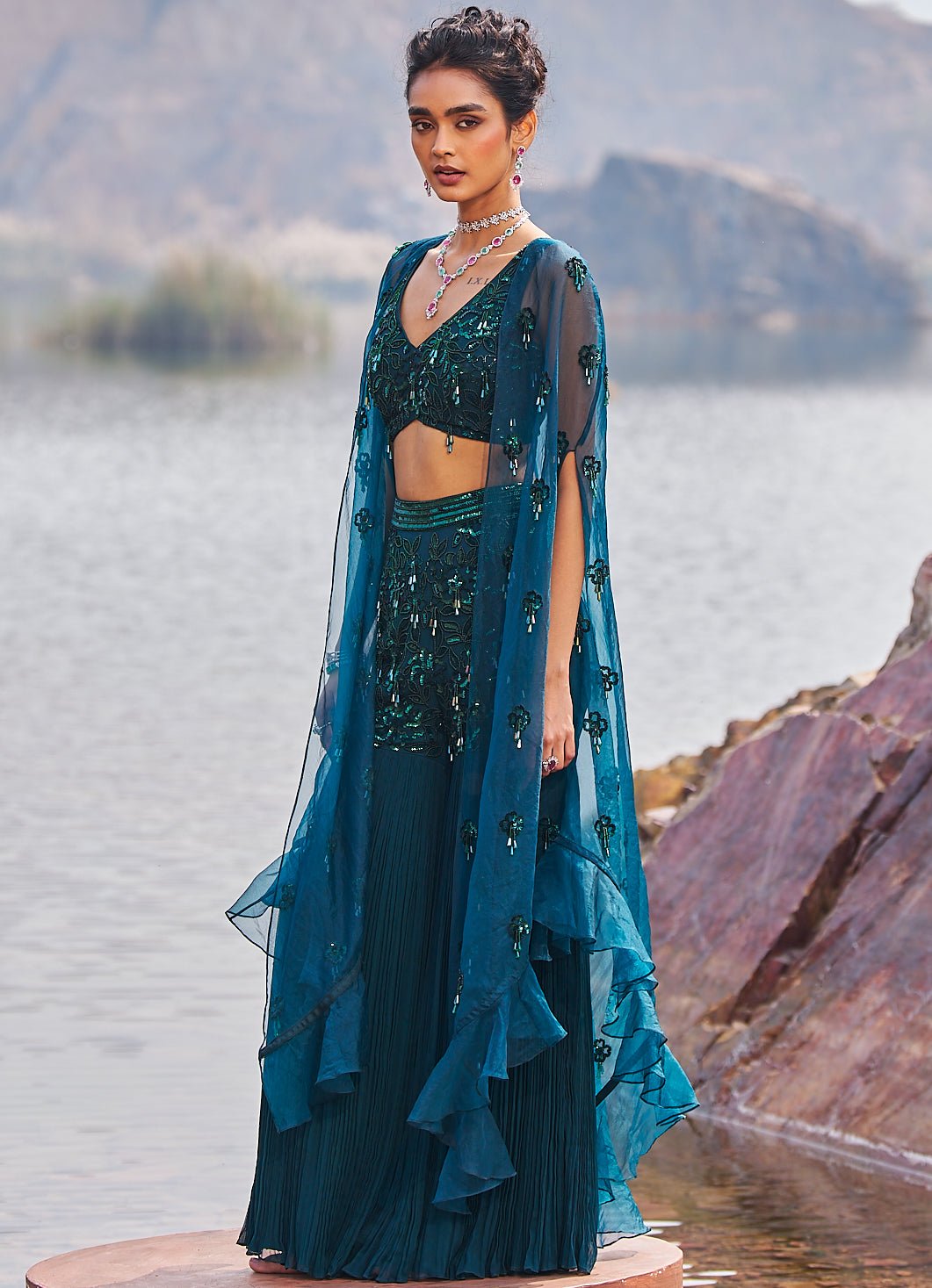 Bottle green sharara set with embroidered cape for weddings UK by Nidhika Shekhar