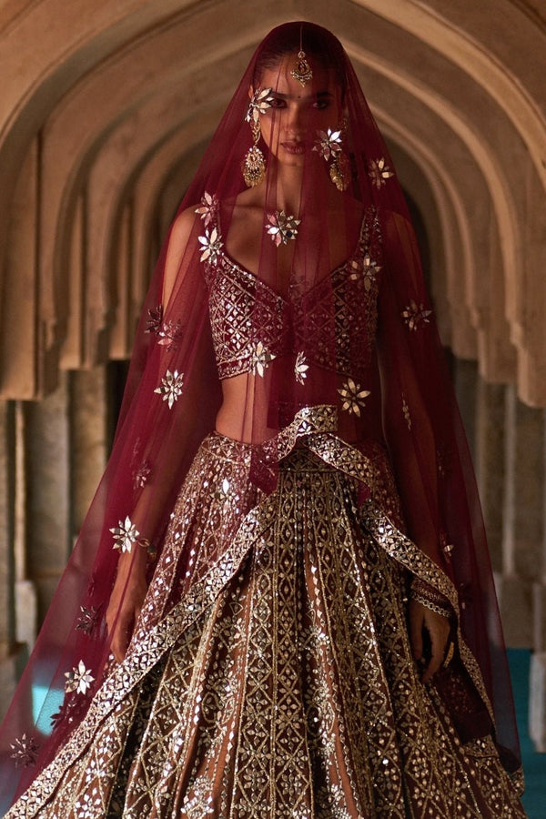 Brown and maroon red raw silk traditional bridal lehenga set by Angad Singh