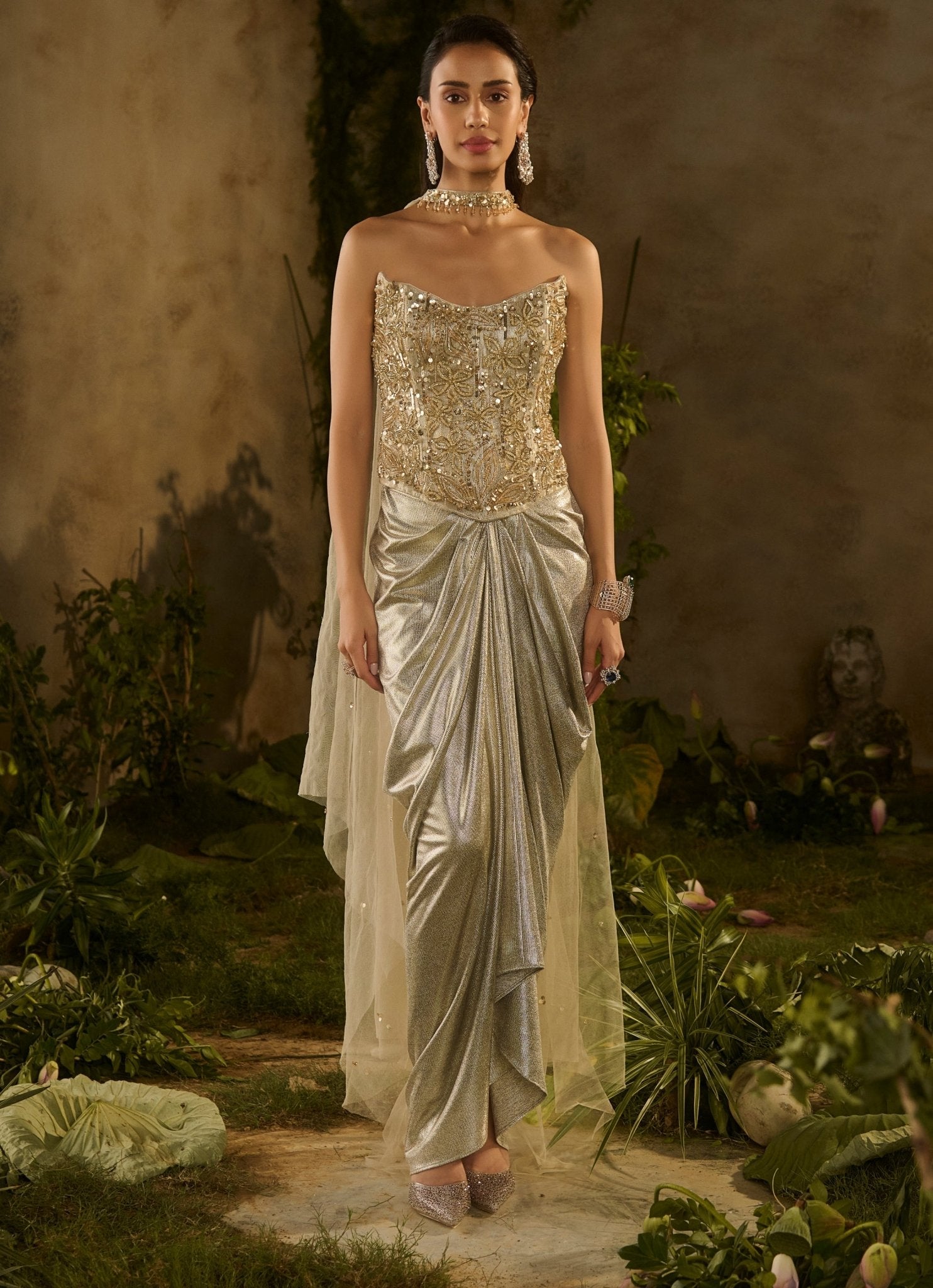 Parul Gandhi champagne gold sequinned corset with drape skirt — reception and festive evening