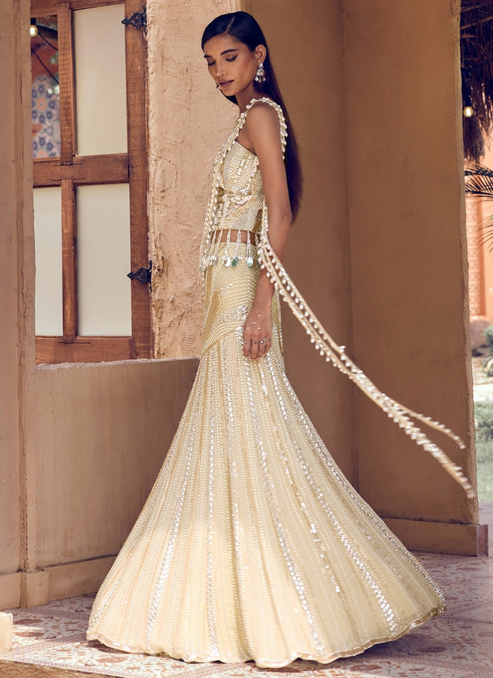 Nidhika Shekhar Champagne Pearl Georgette Pre-Draped Saree With CorsetFabilicious Fashion