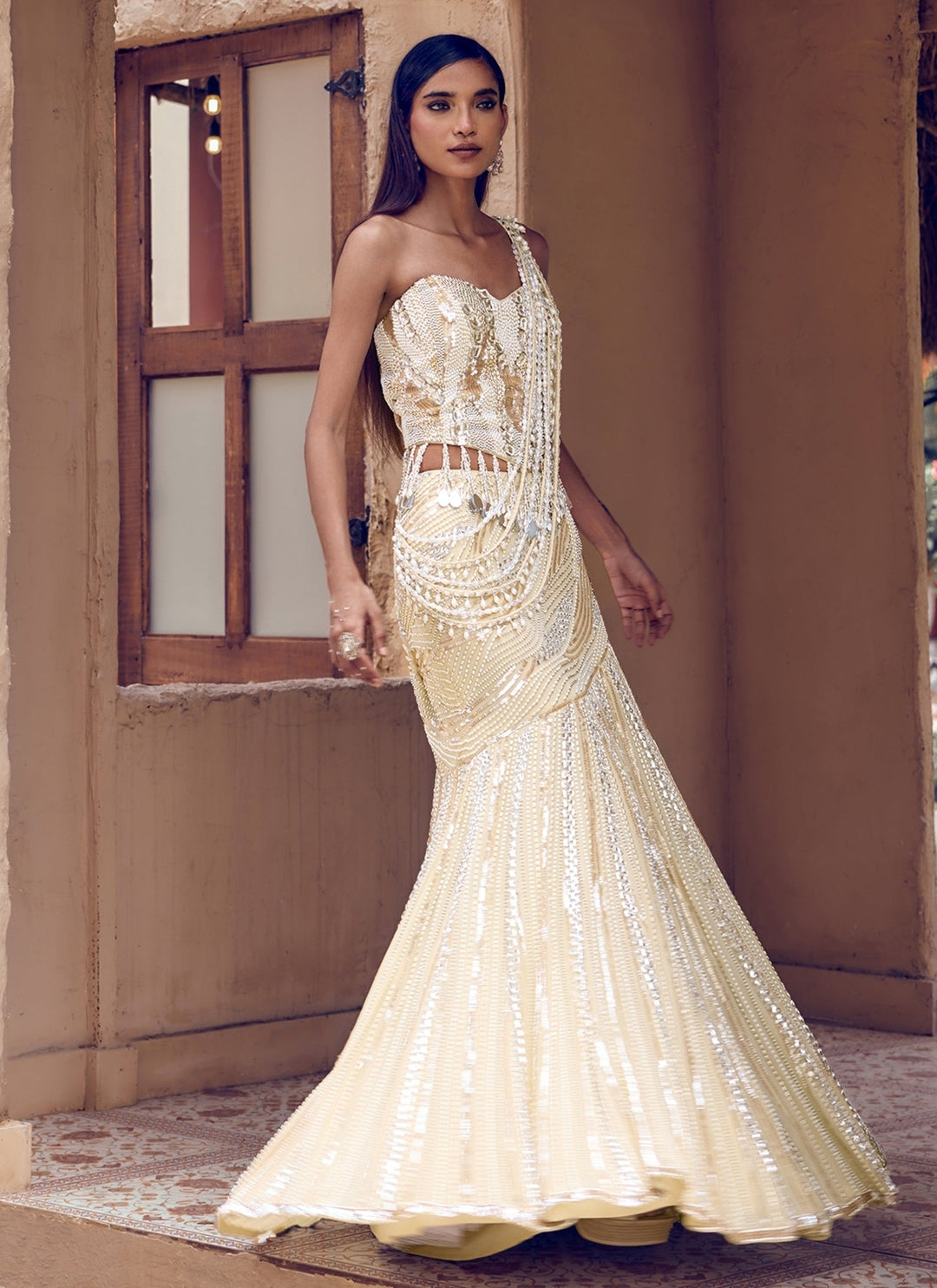 Nidhika Shekhar Champagne Pearl Georgette Pre-Draped Saree With CorsetFabilicious Fashion