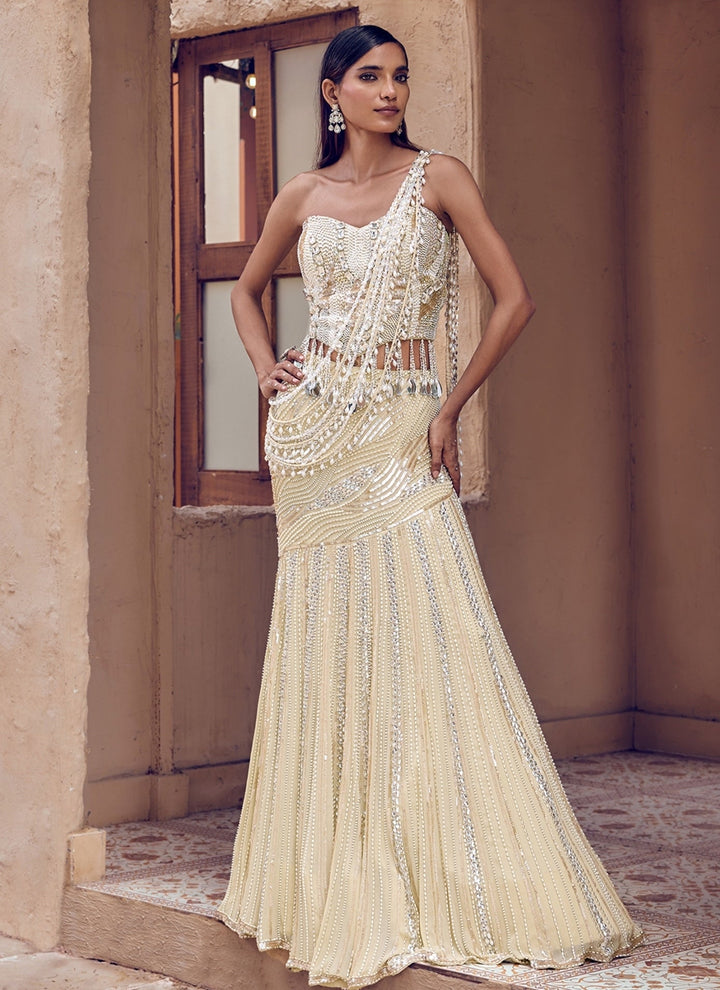 Nidhika Shekhar Champagne Pearl Georgette Pre-Draped Saree With CorsetFabilicious Fashion