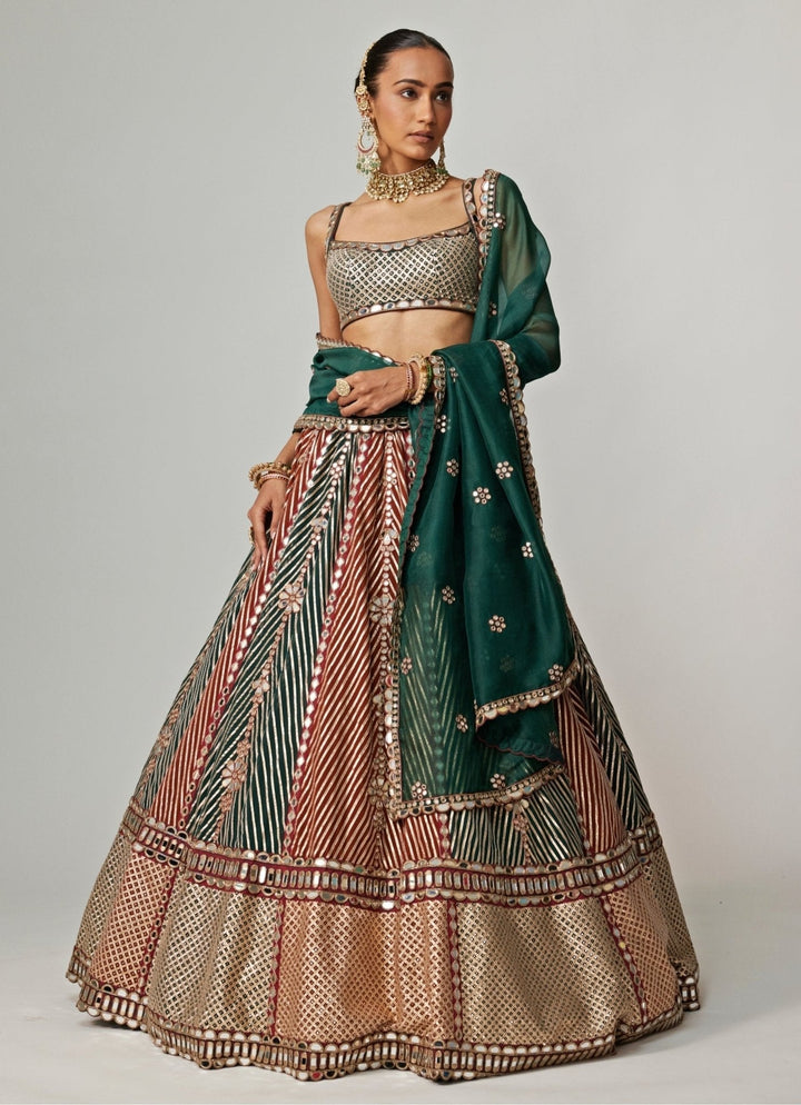 Cranberry Red And Green Embroidered Bridal Lehenga Set Vvani by Vani Vats - Fabilicious Fashion