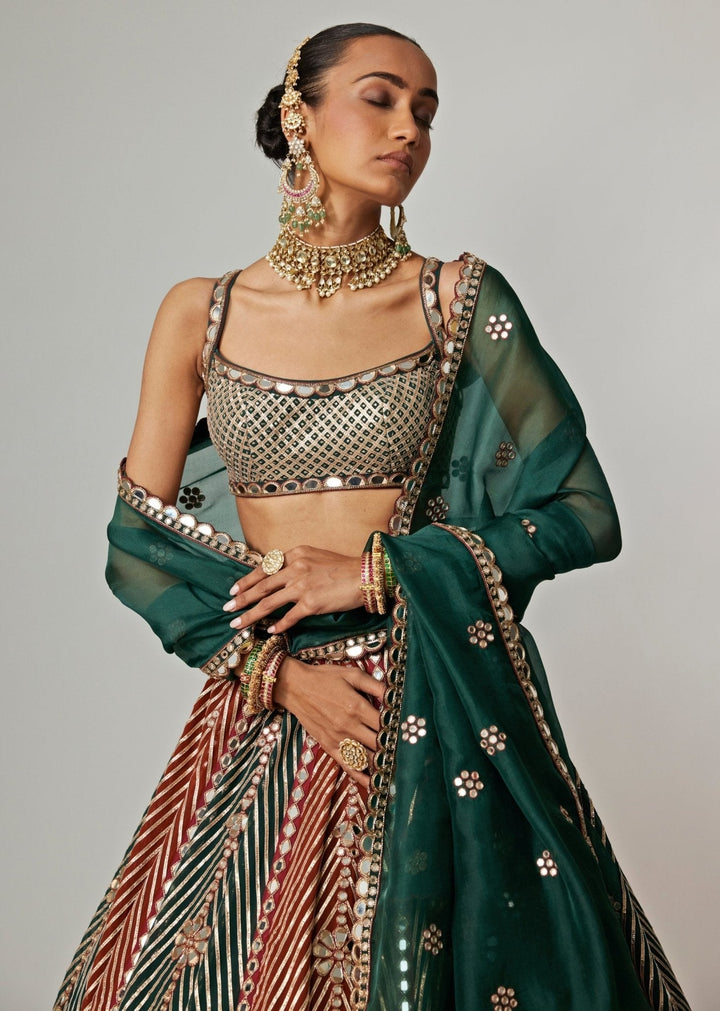 Cranberry Red And Green Embroidered Bridal Lehenga Set Vvani by Vani Vats - Fabilicious Fashion