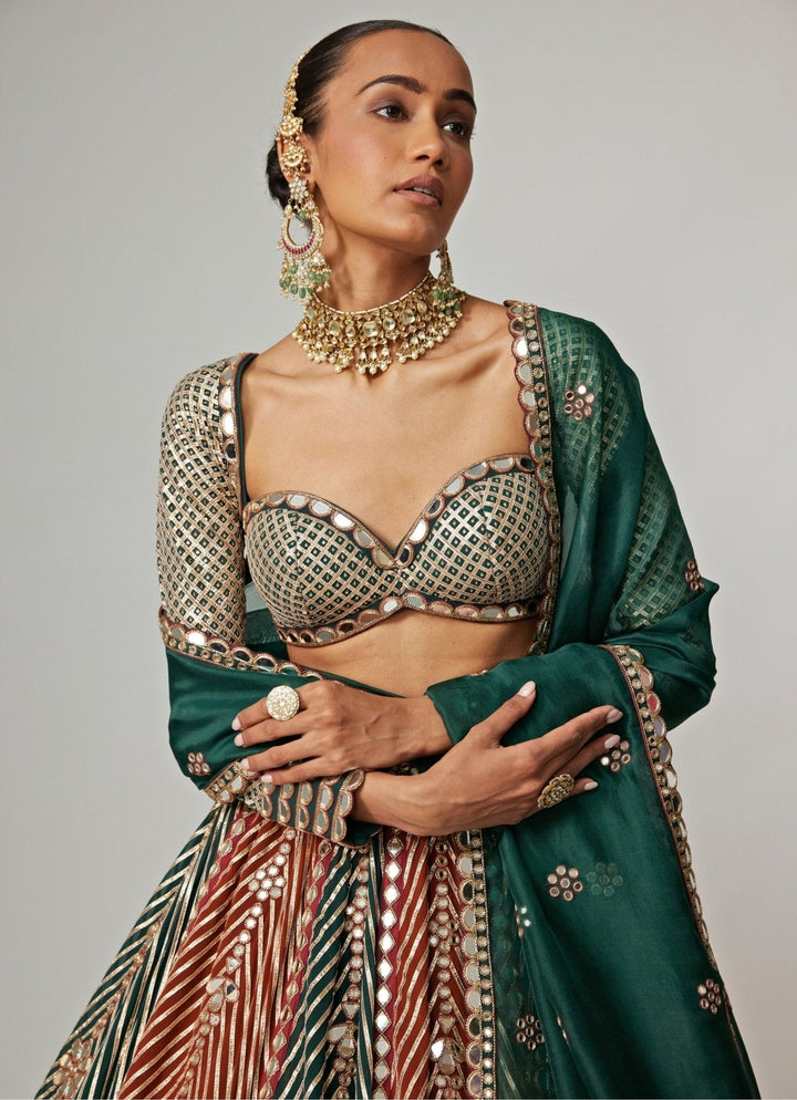 Cranberry Red And Green Embroidered Bridal Lehenga Set Vvani by Vani Vats - Fabilicious Fashion