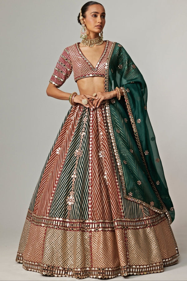 Cranberry red multicolour embroidered traditional bridal lehenga set by Vvani by Vani Vats