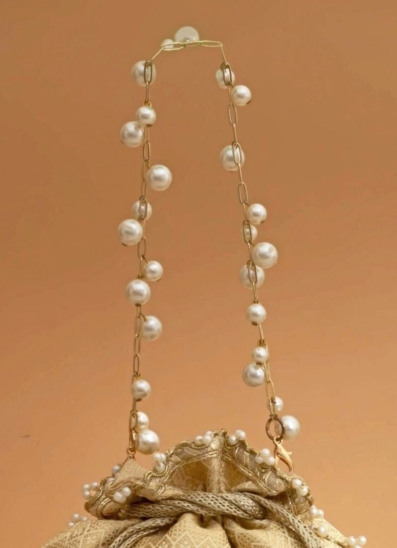 Cream Silk Embroidered Potli Amyra - Fabilicious Fashion