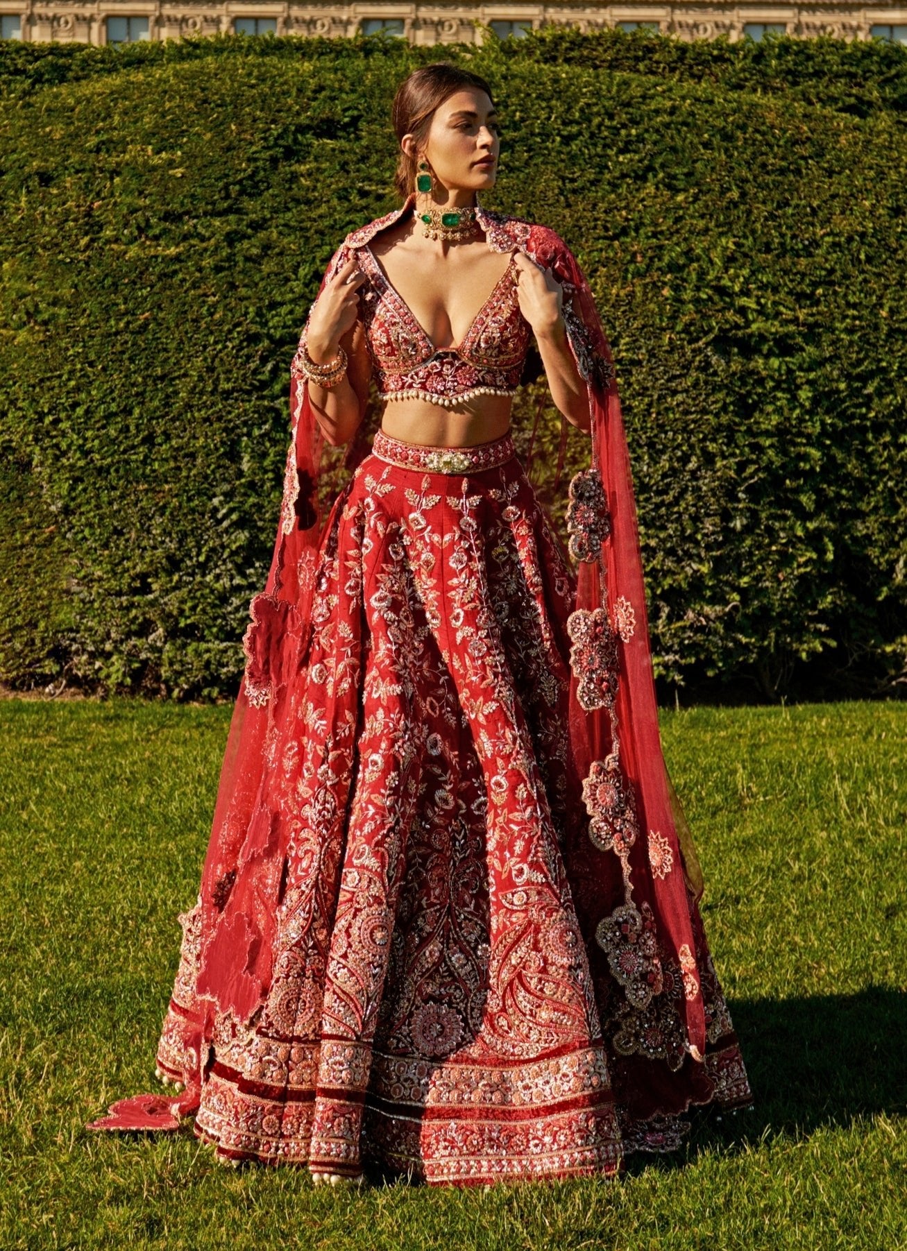 Crimson red embroidered bridal silk lehenga by Jigar and Nikita