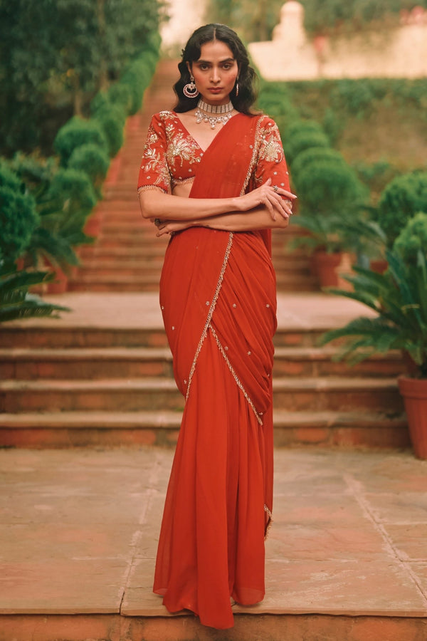 Paulmi and Harsh crimson red georgette pre-draped saree for Diwali
