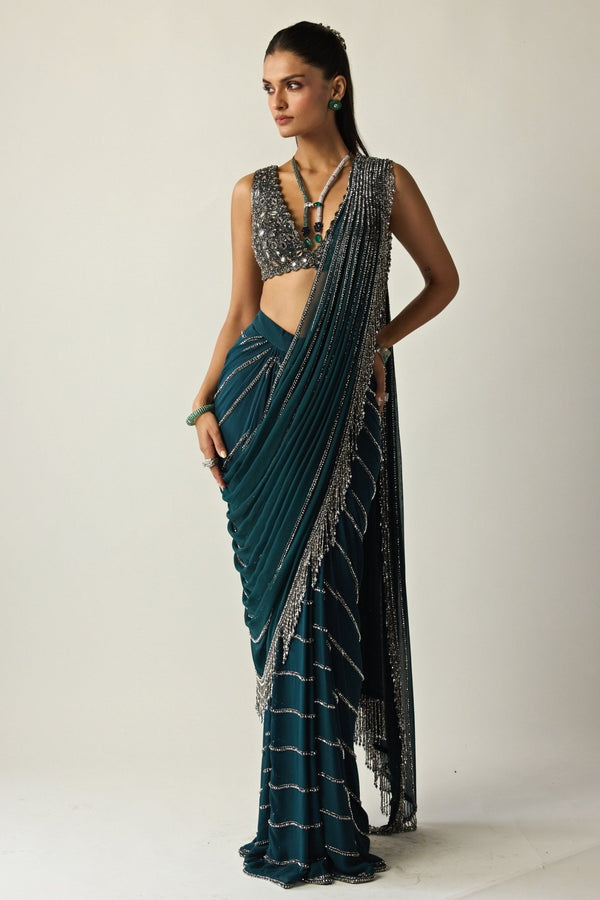 Dark teal green linear georgette pre-draped saree by Vvani by Vani Vats
