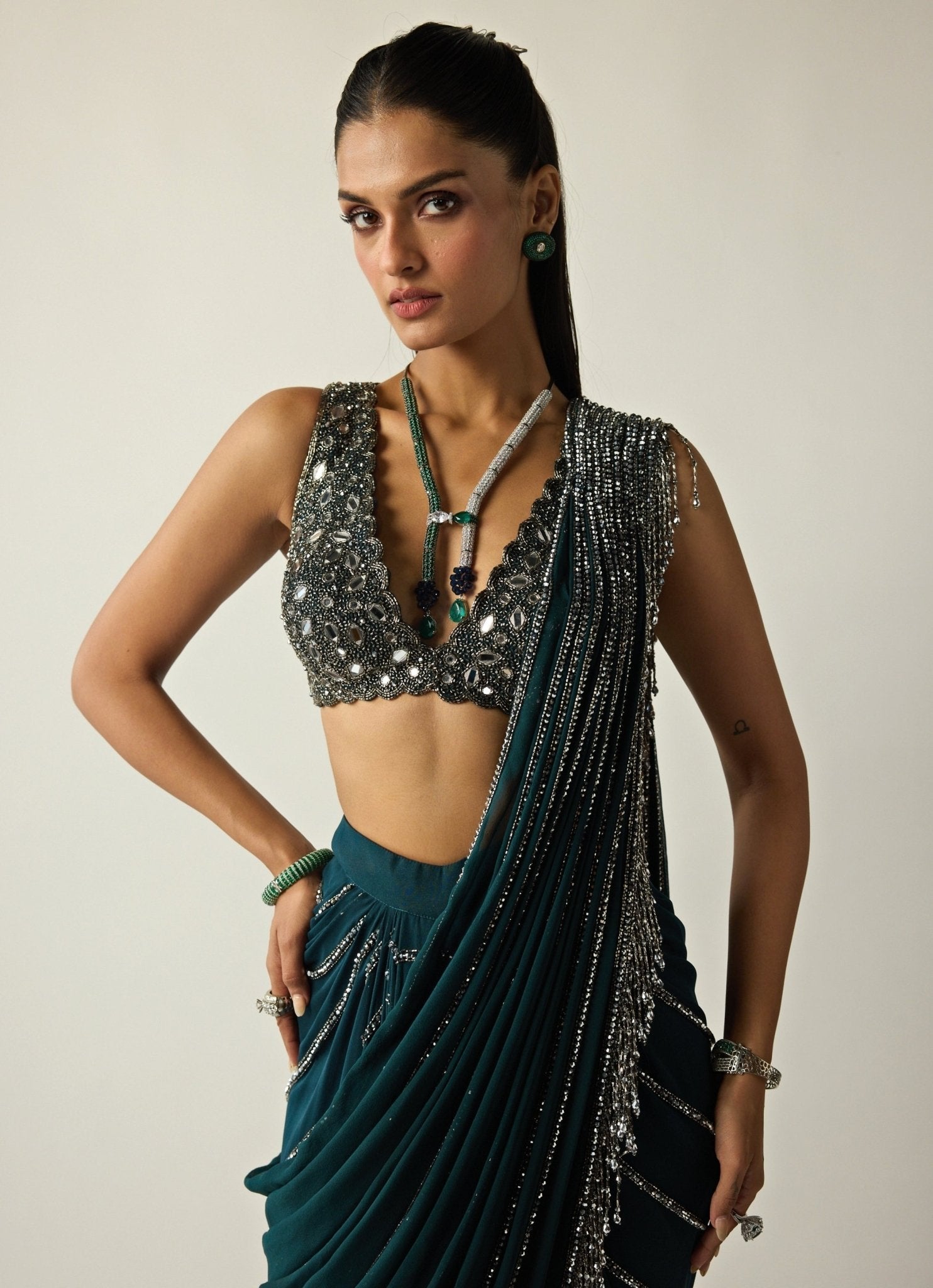 Dark teal green pre-draped Vani Vats saree