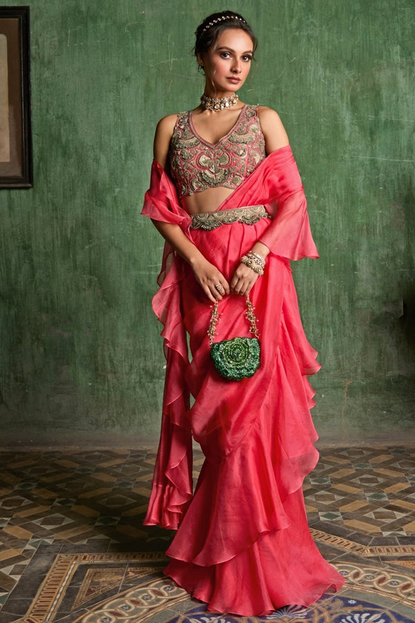 Deep peach organza pre-draped saree by Prisho