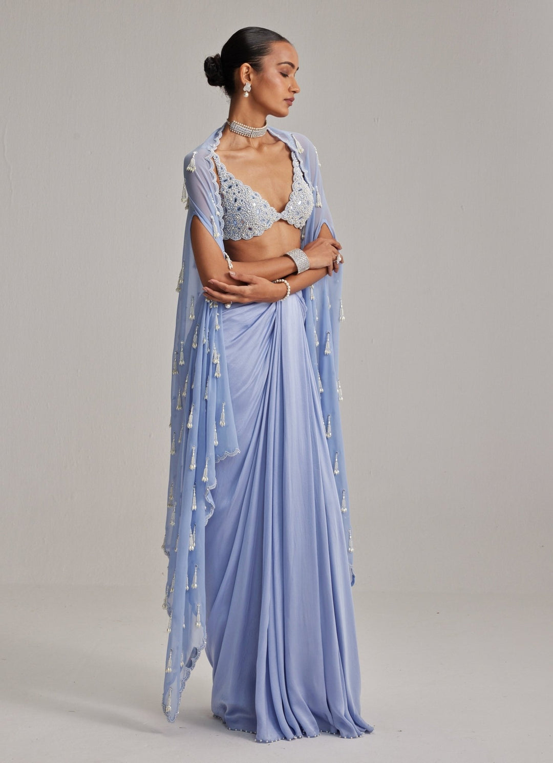 Dew Blue Pearl Embroidered Satin Drape Skirt Set With Cape Vvani by Vani Vats - Fabilicious Fashion