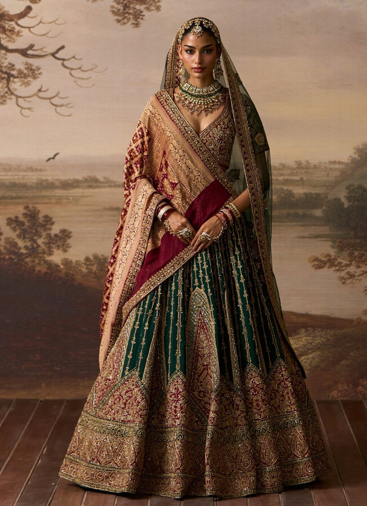Angad Singh Emerald Green And Maroon Red Raw Silk Bridal LehengaFabilicious Fashion